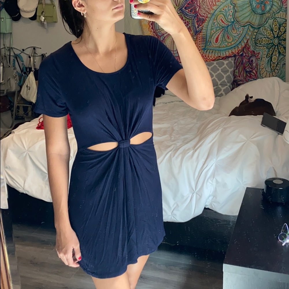 Navy dress with knotted accent and cut out